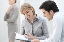 stock image of two people having a meeting